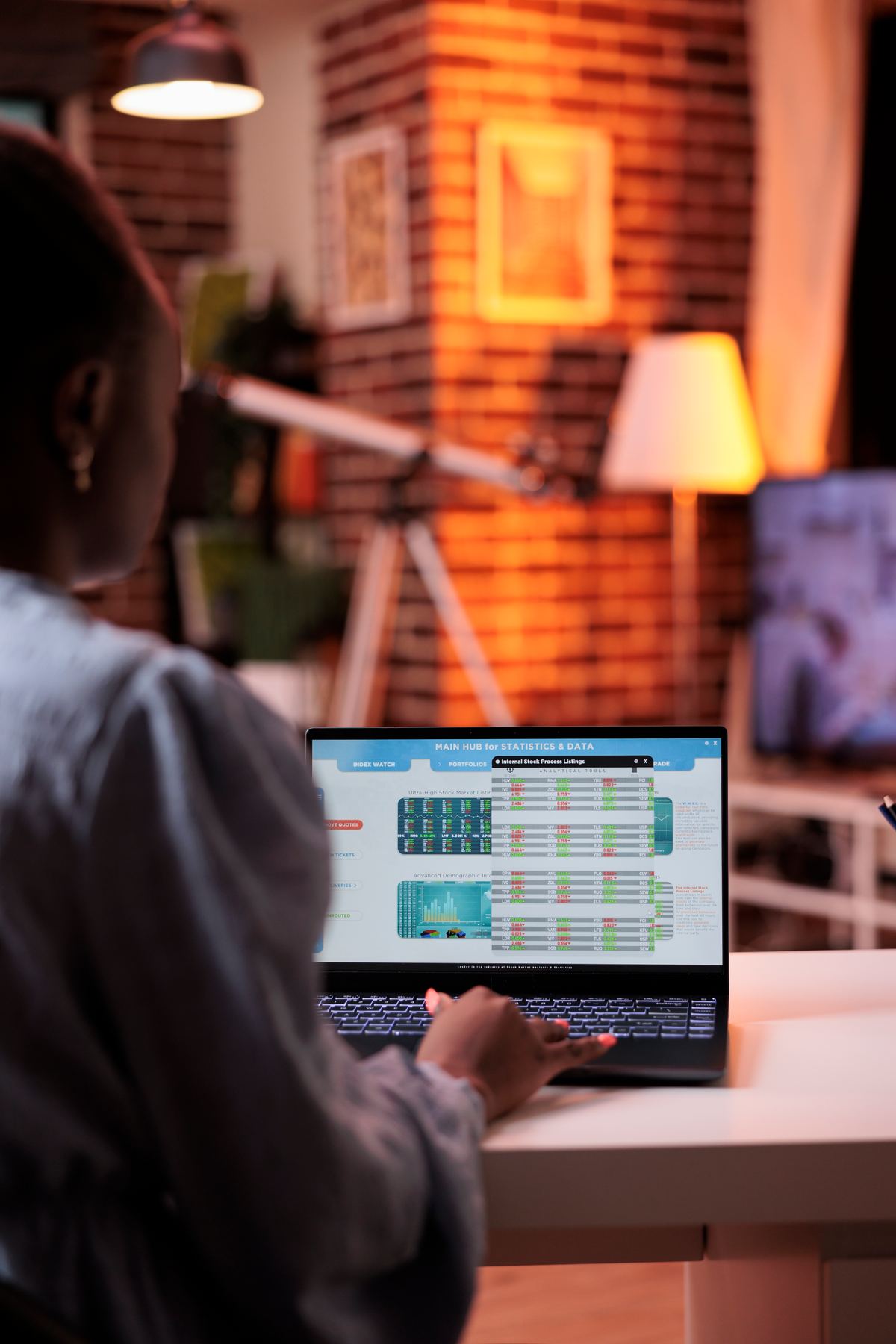 Solar energy monitoring dashboard shown on a laptop screen